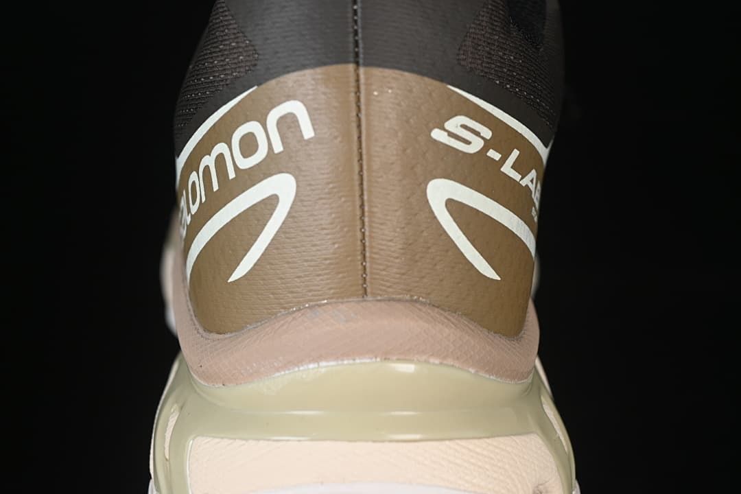 Rear view showing the brown heel panel and sculpted midsole.