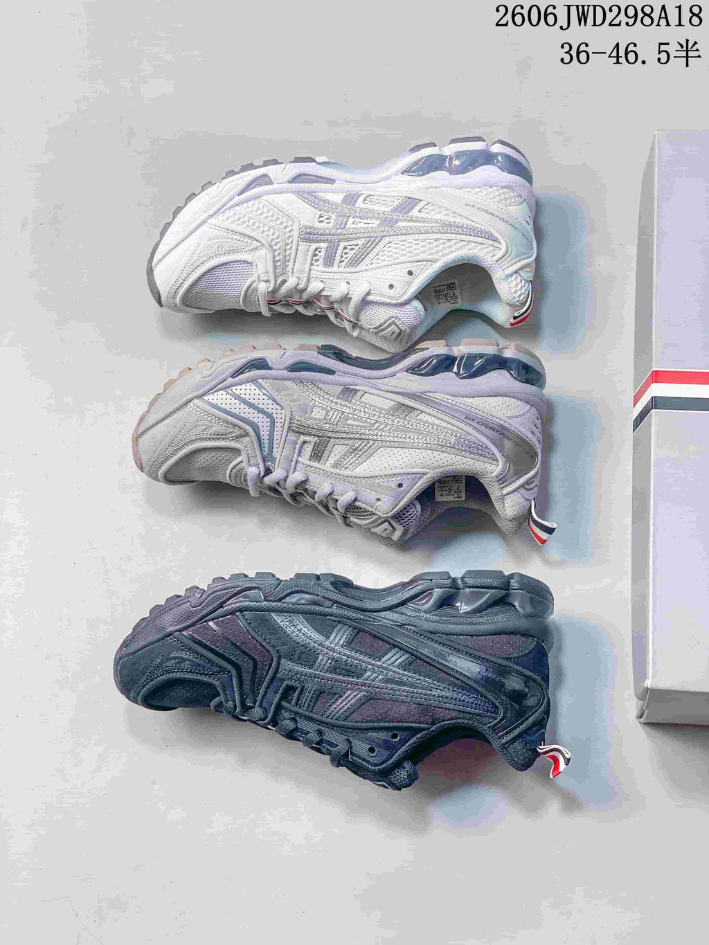 Three colorways of the sneaker shown in a side view.