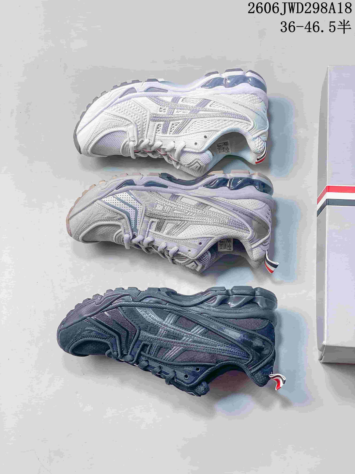 Three colorways of the sneaker shown in a side view.