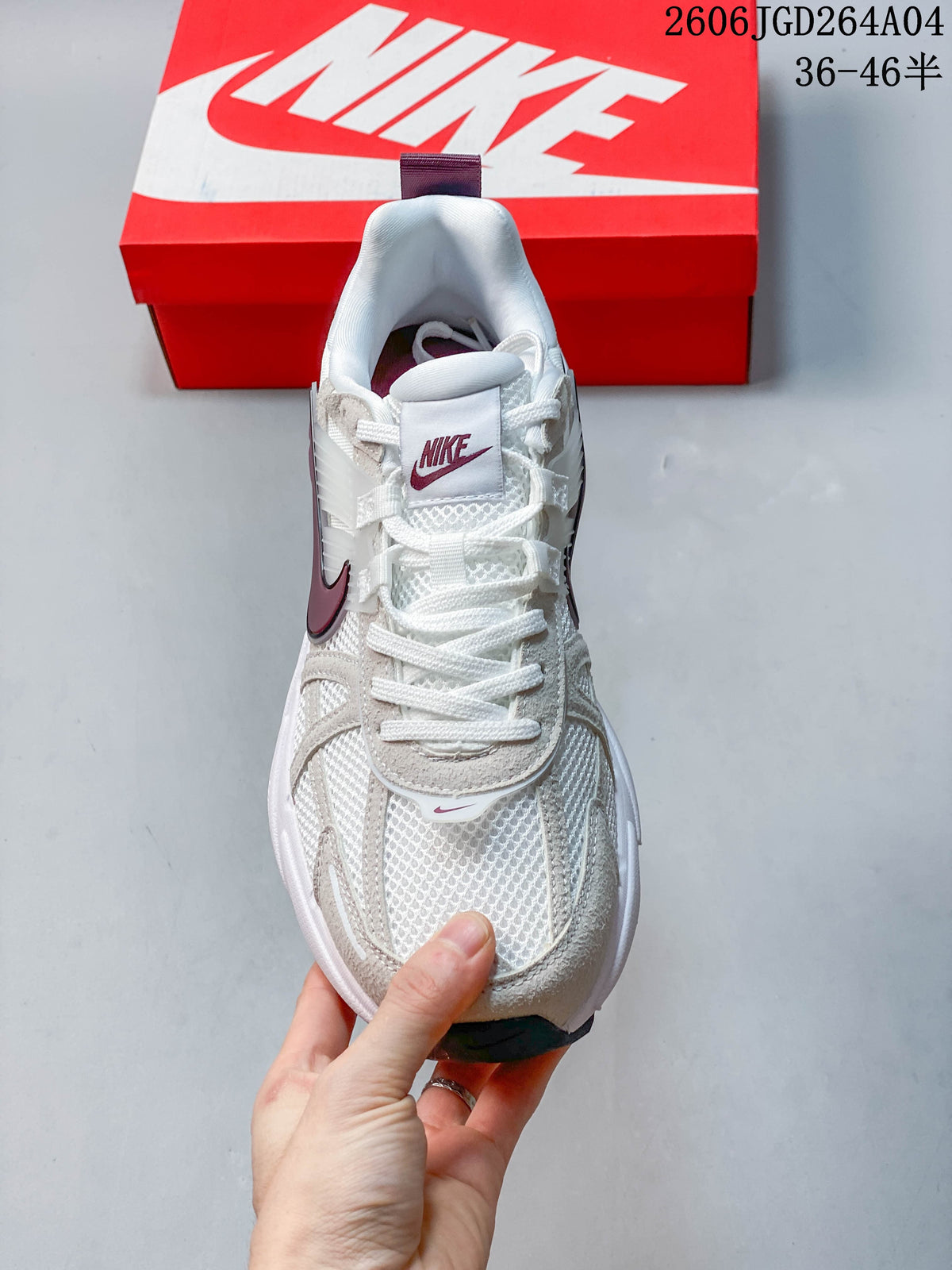Top view of the Nike V2K Run showing the laces, mesh panels, and layered overlays