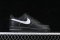 Side view of a black low-top sneaker with a white side accent and contrast stitching