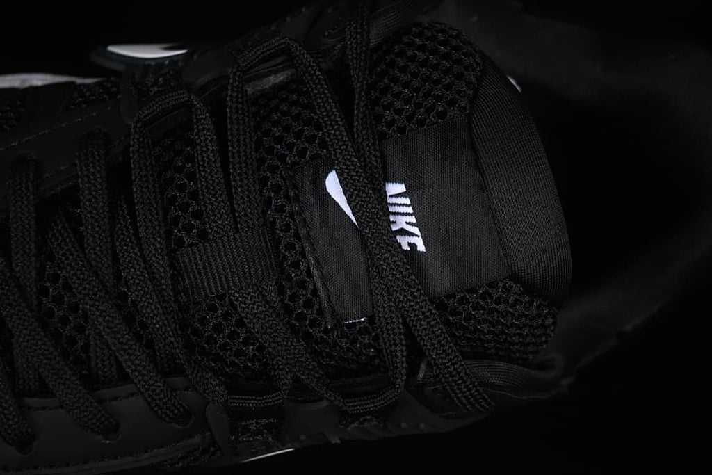 Top close-up of the mesh tongue and lace area.