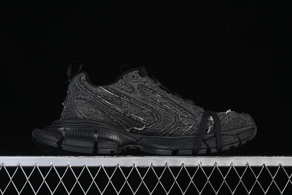 Side profile highlighting the layered upper and chunky segmented sole.