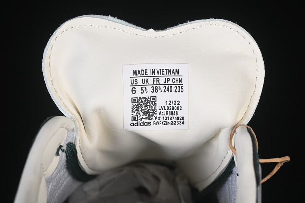 Close-up of the white shoe tongue label showing size information