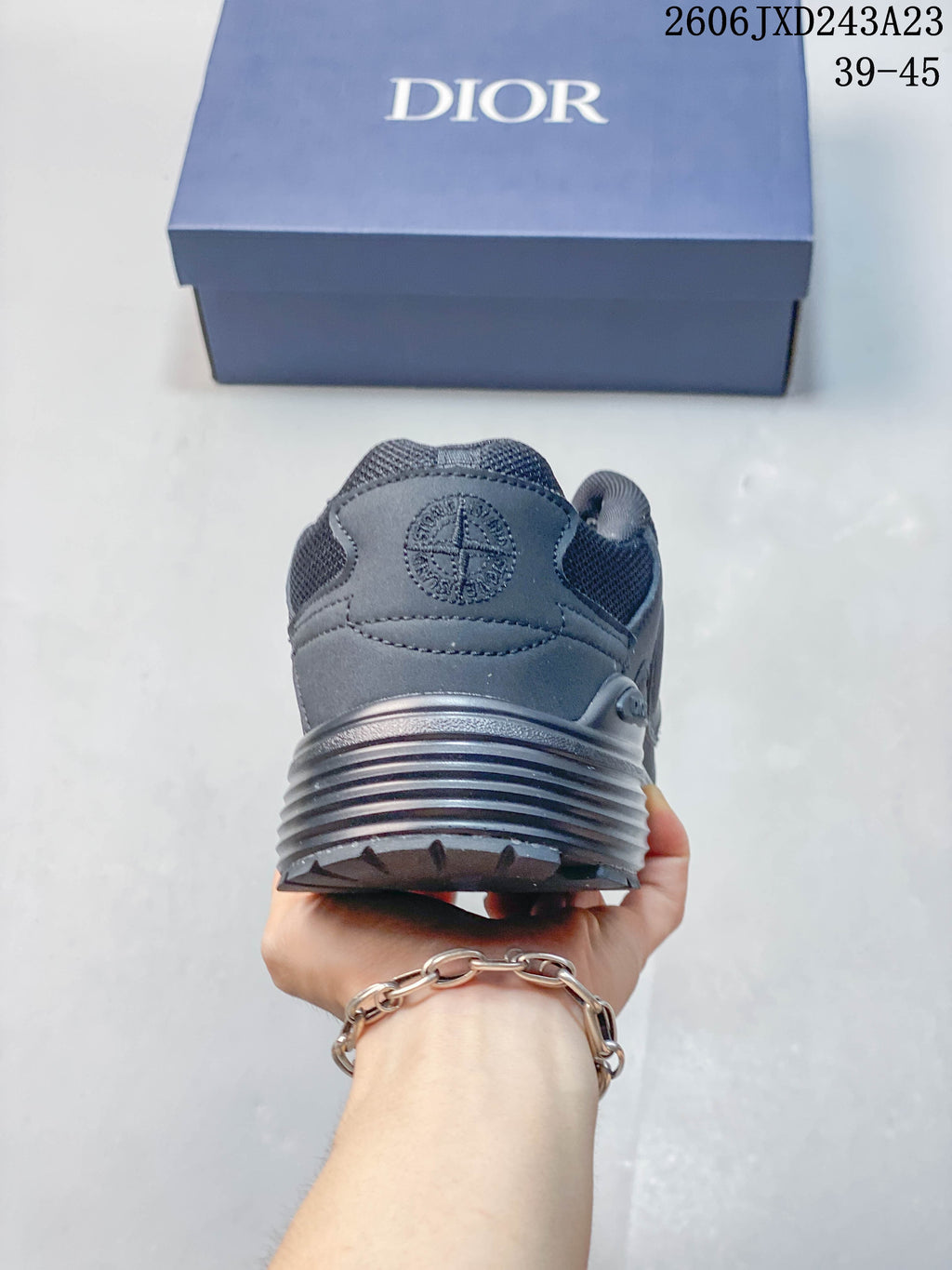 Rear view of a charcoal gray low-top sneaker