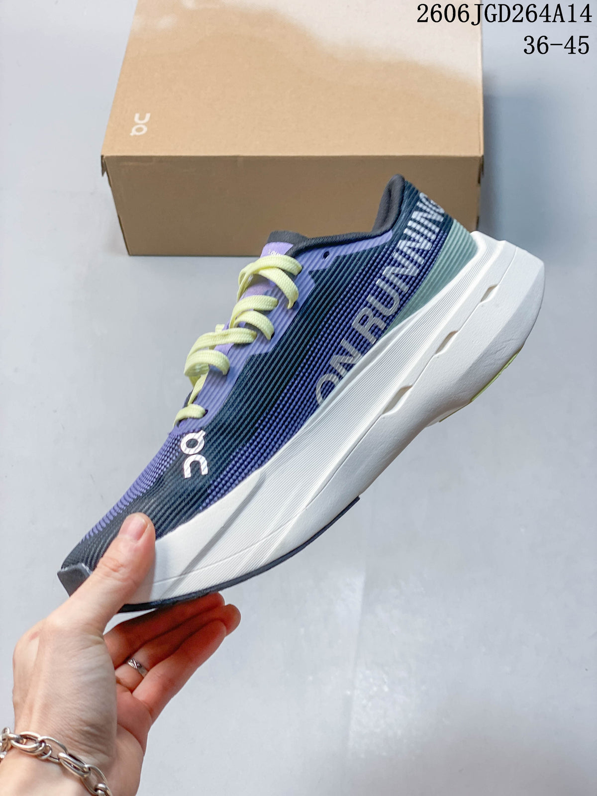 Side view of the navy and violet running shoe with pale lime laces and a light-colored midsole.