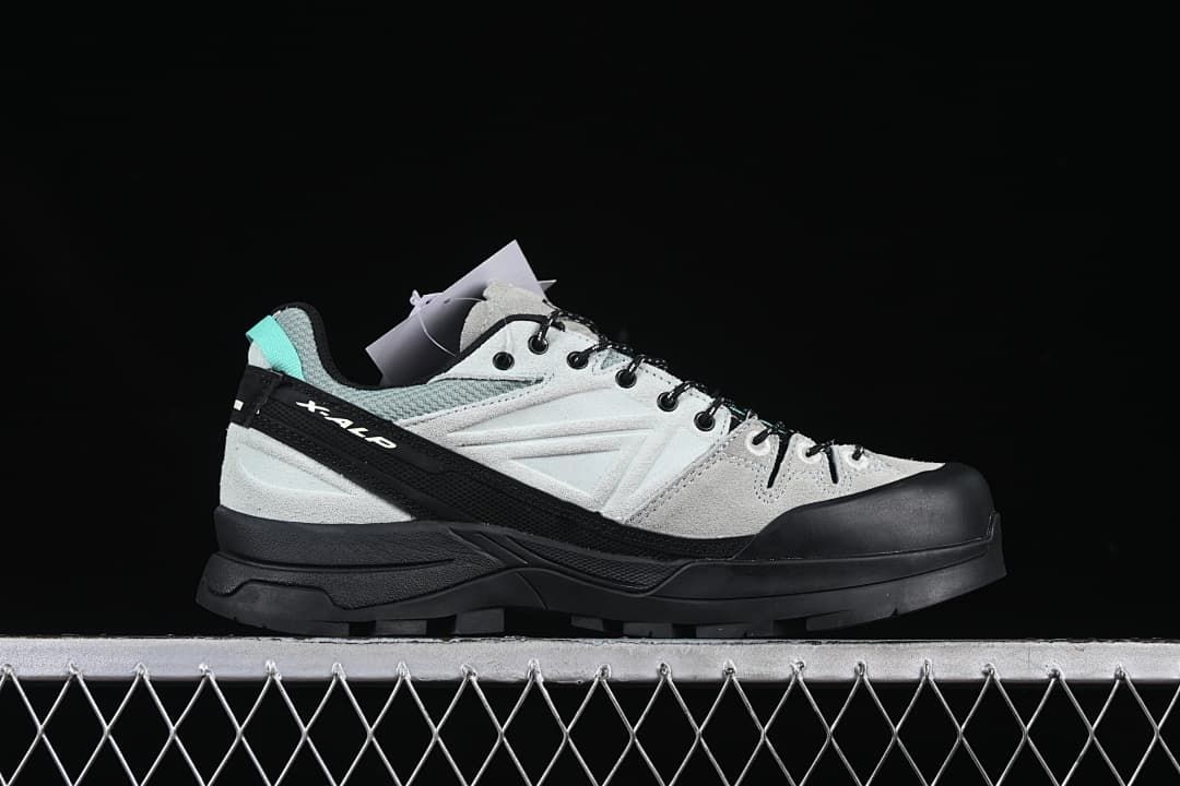 Side profile of the X-ALP shoe with its protective toe and layered sole.