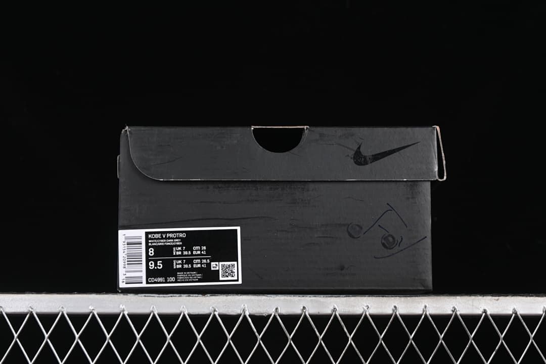Shoe box label showing Kobe V Protro, style code CD4991 100, and sample size details.