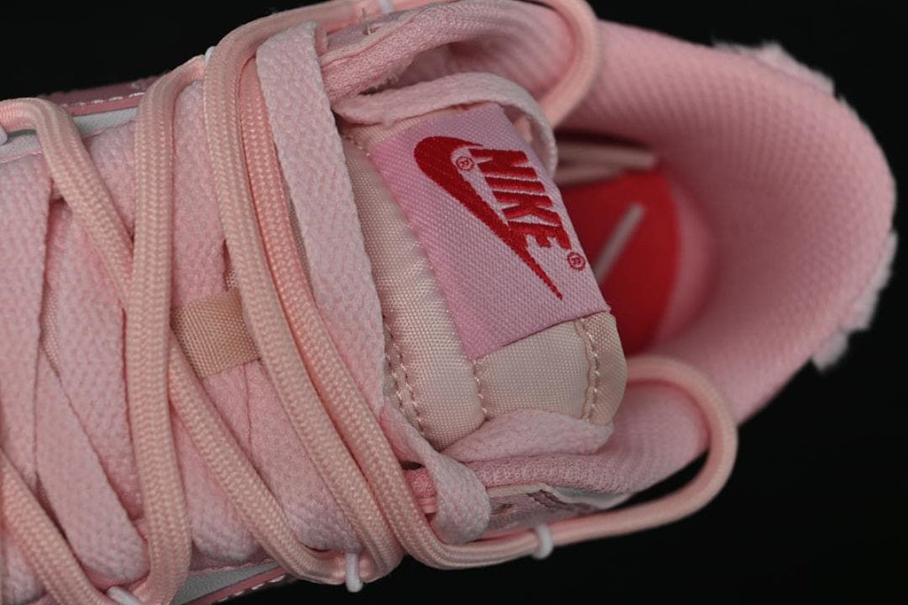 Close-up of pink laces and tongue label.