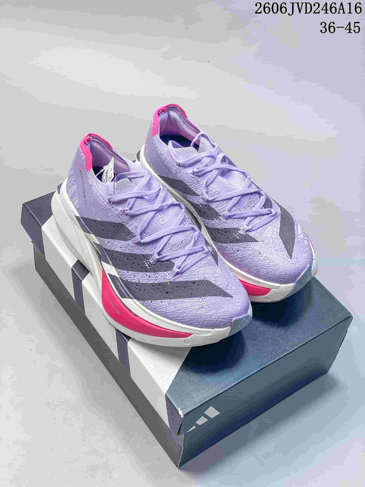 Pair of lavender adidas Adizero Prime X 3.0 Strung running shoes with dark stripes and pink accents