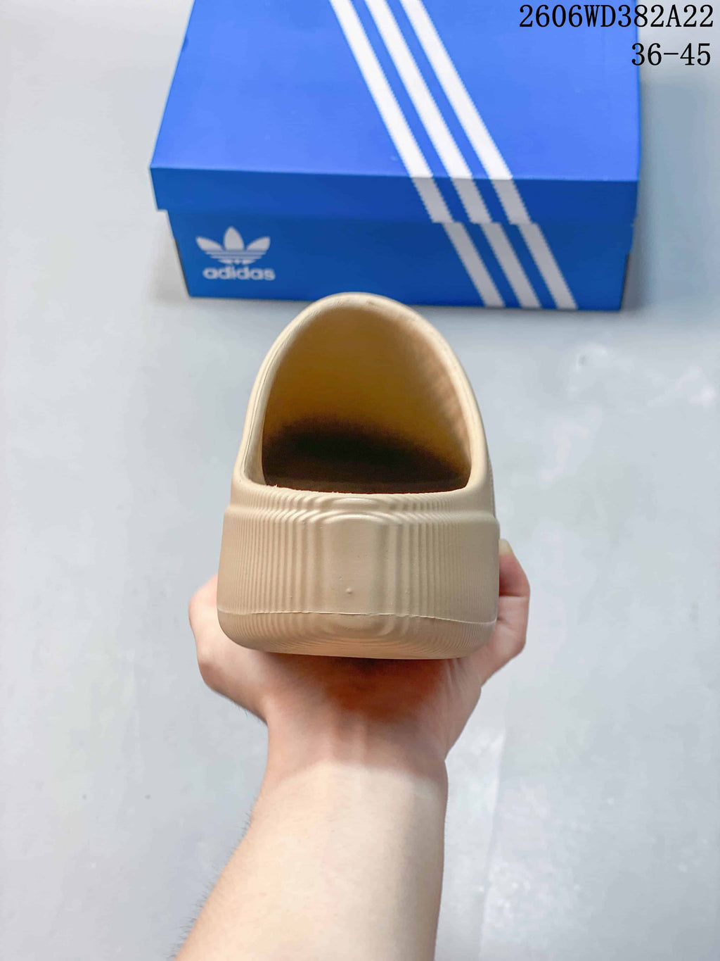 Rear view of a beige slip-on clog