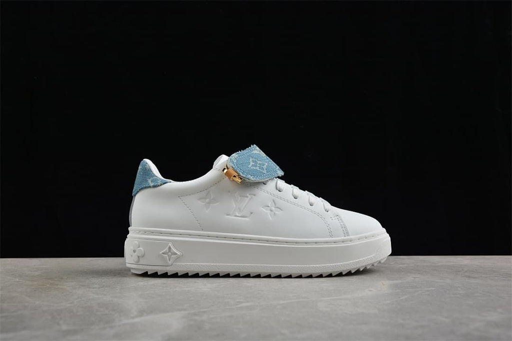Side view showing embossed motifs and a blue denim-look lace flap