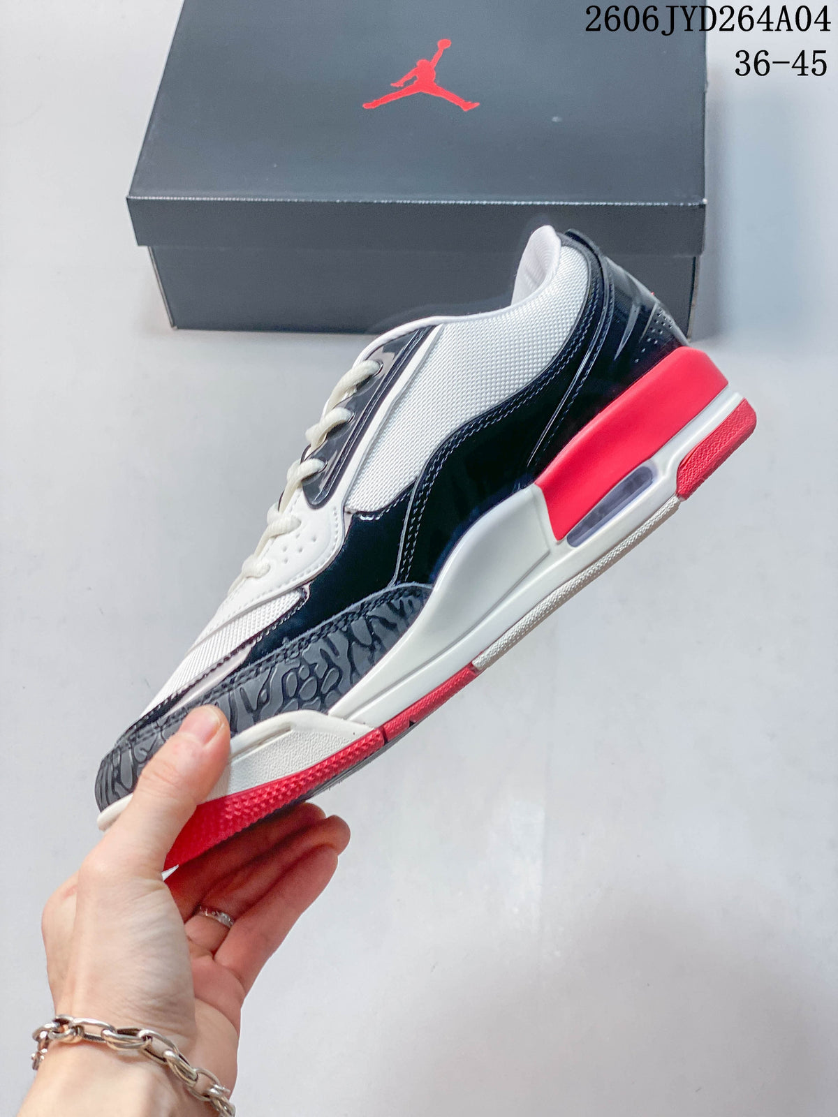 Side profile of the sneaker showing layered overlays and red outsole details