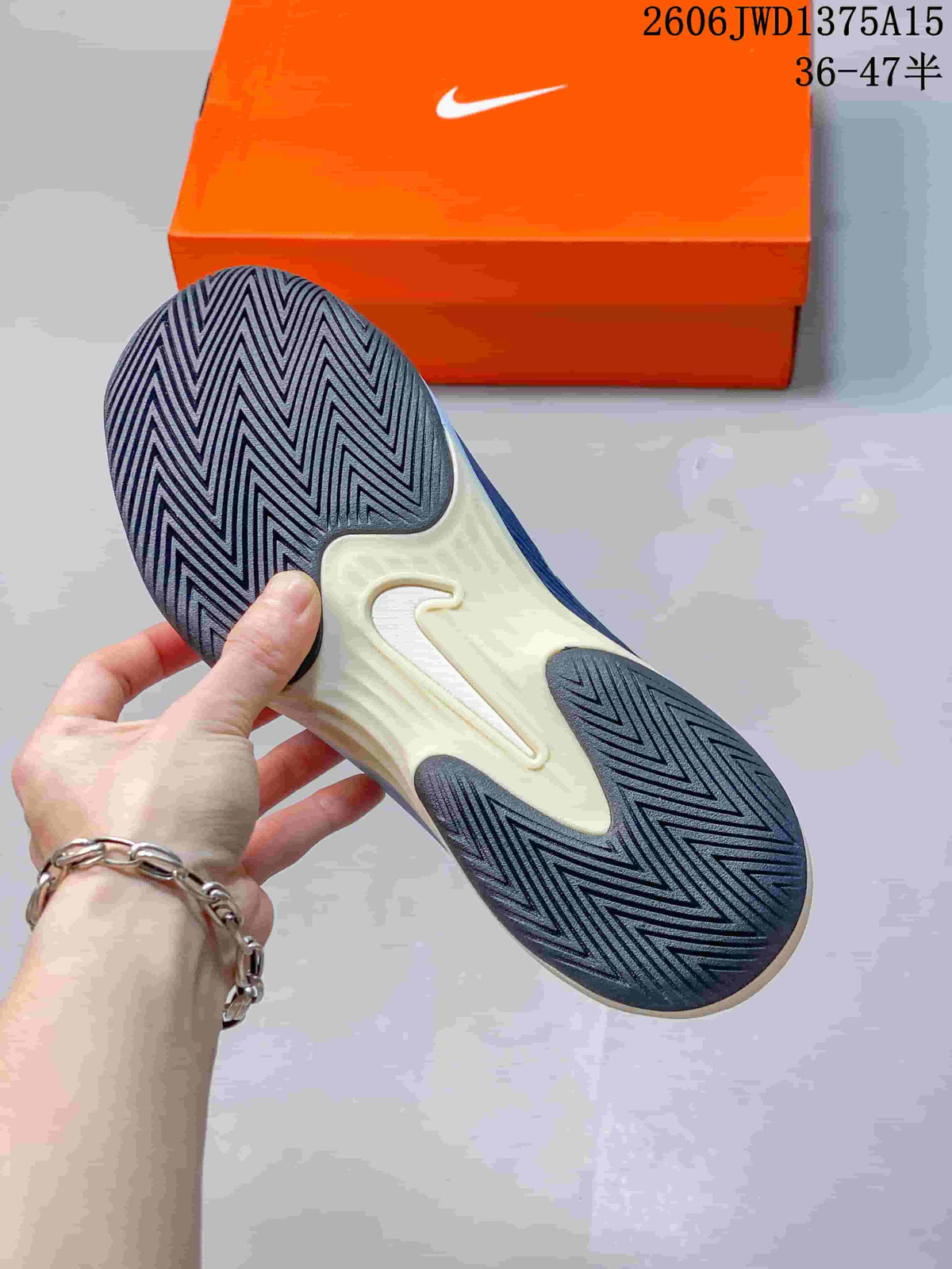 Underside of a Nike Vapor 12 shoe showing its patterned outsole