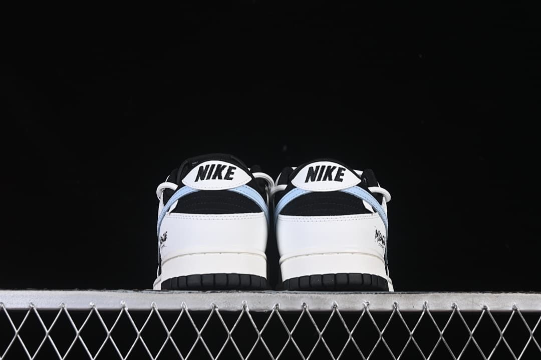 Rear view of both sneakers showing heel tabs and light blue accents