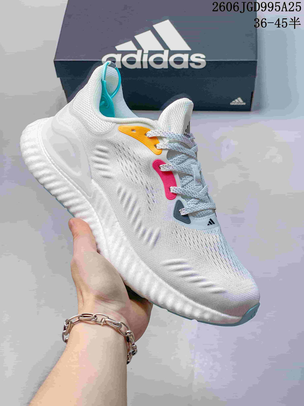 White adidas Switch FWD M sneaker with bright accent details and a ridged sole