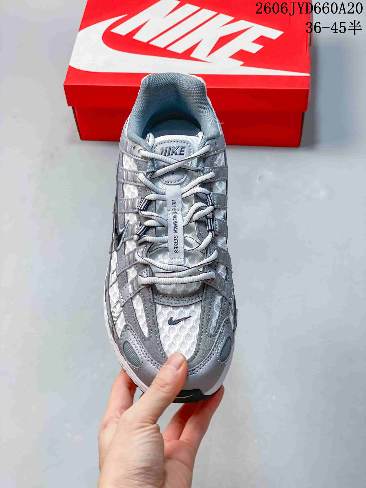 Top view of a silver and grey lace-up Nike P-6000 sneaker.