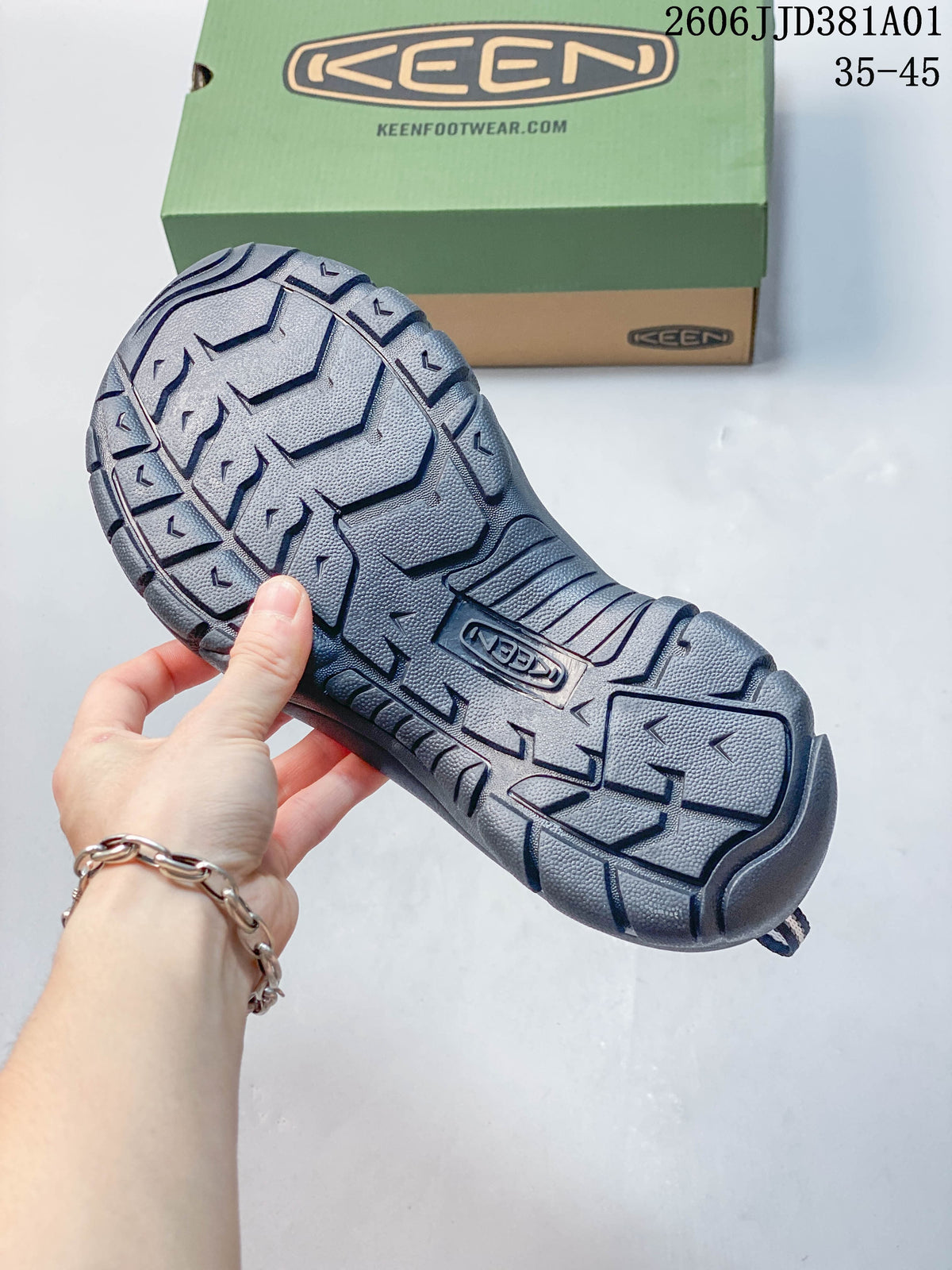 Close-up of the dark gray outsole tread on a KEEN Newport H2 sandal.