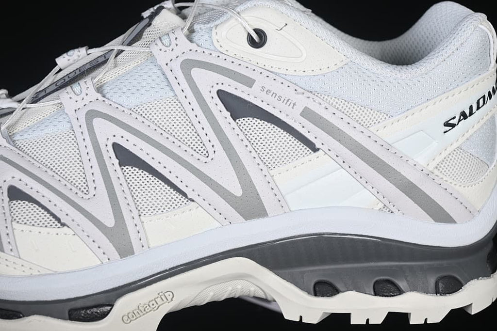 Close-up of side overlays, mesh-look panels and midsole