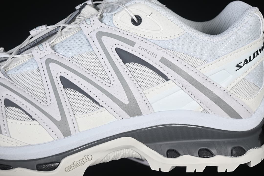 Close-up of side overlays, mesh-look panels and midsole