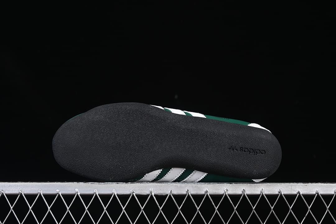 View of the black outsole with adidas branding.