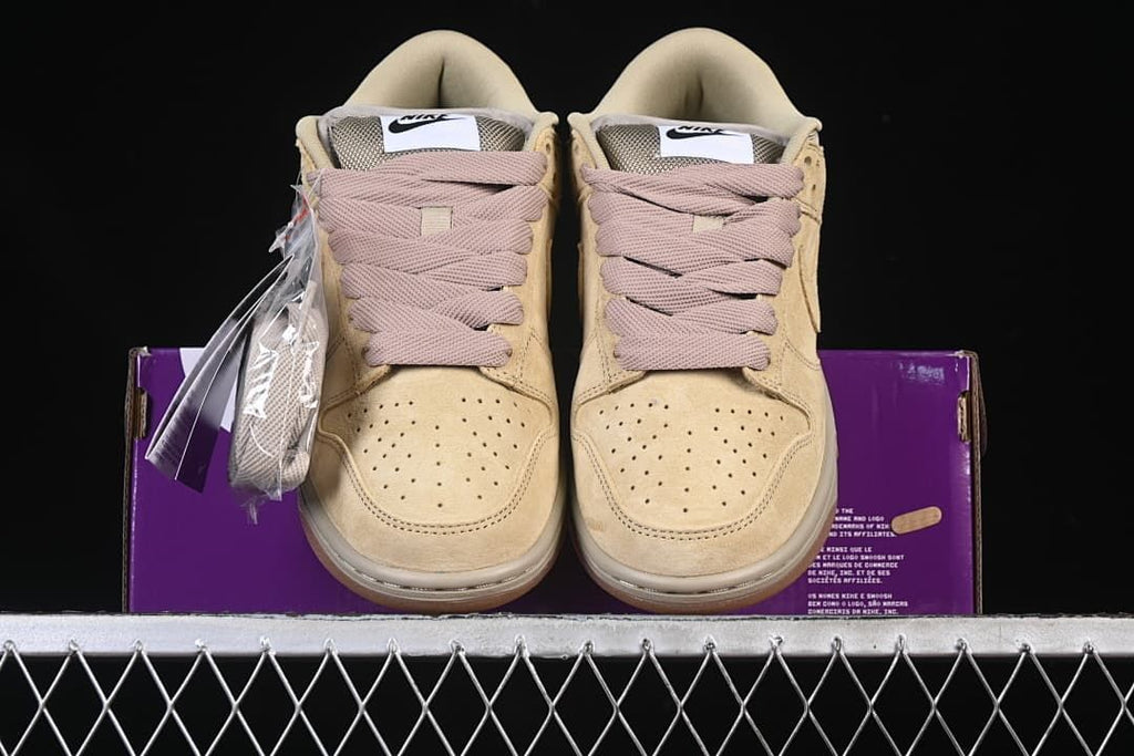 Front view of the pair showing perforated toe panels and laces