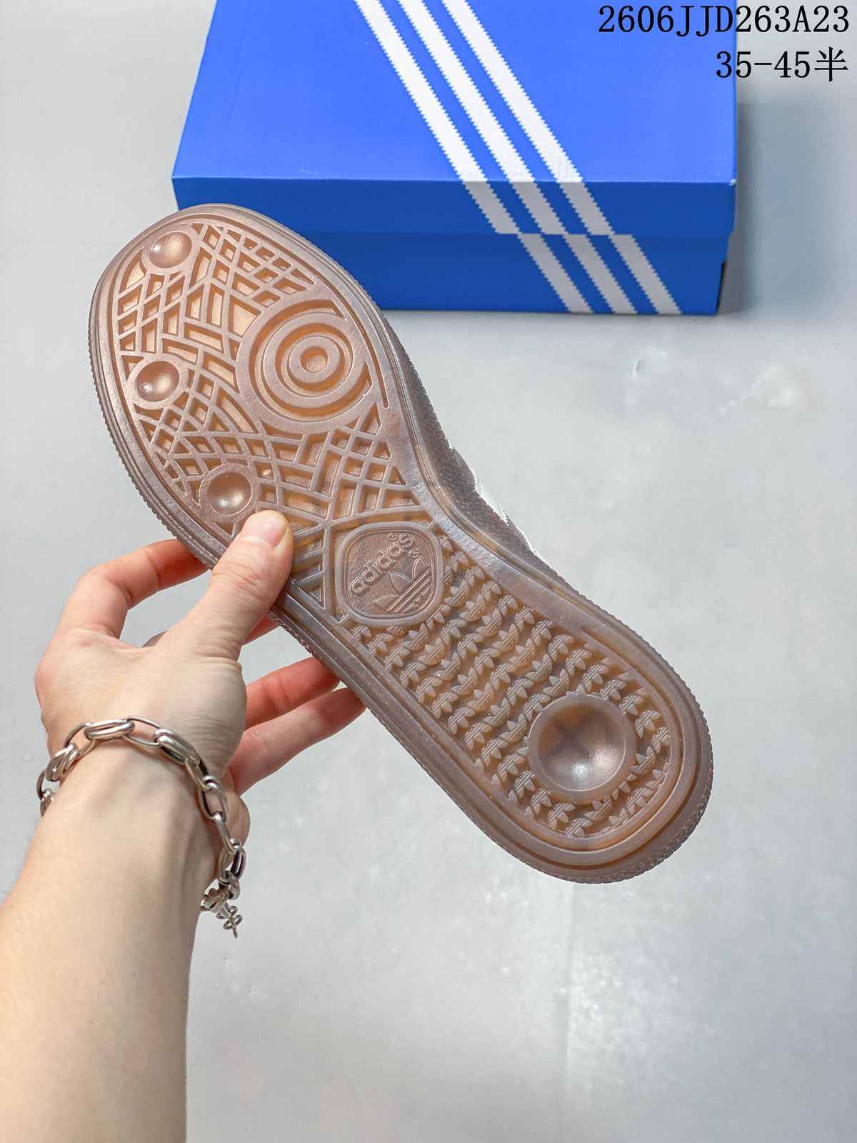 Underside of the sneaker showing the textured gum-colored outsole.