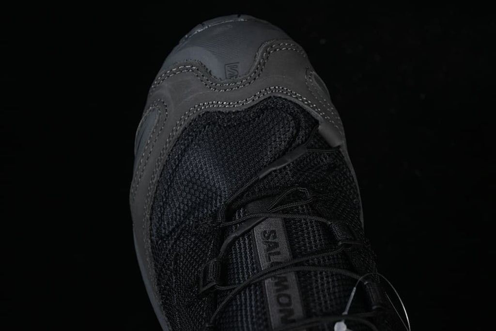 Top view of the shoe showing the toe, mesh upper and laces