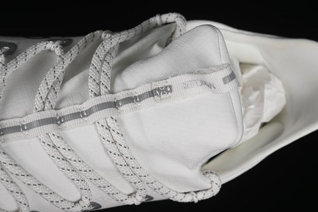 Close-up of patterned laces and upper fastening detail