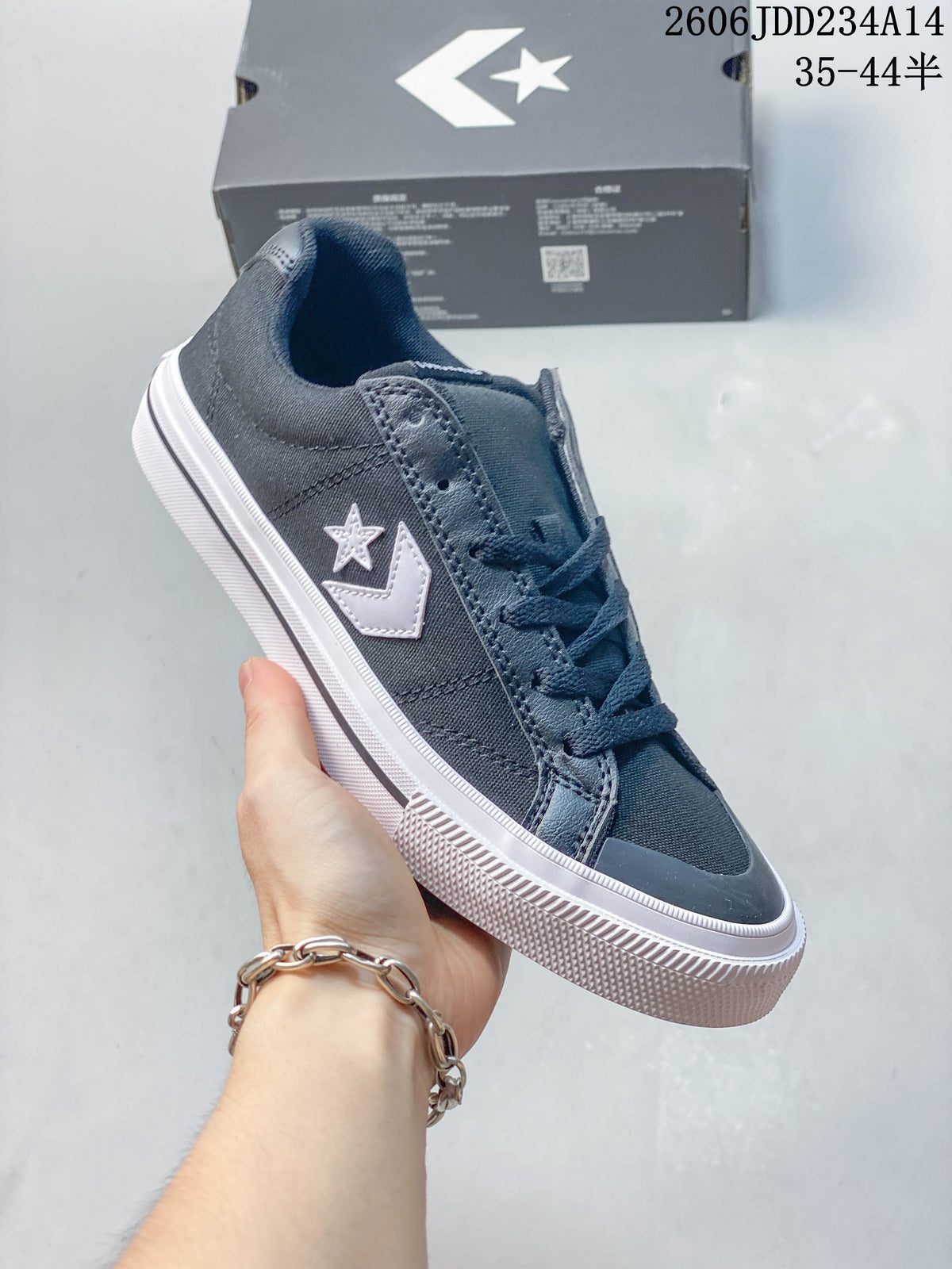 Dark gray Converse Sport Casual low-top sneaker with contrasting star-and-chevron detail