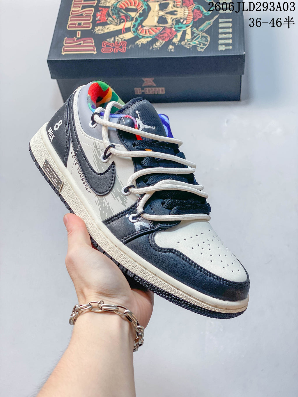 Angled side view showing the sneaker panels, laces, and colorful lining