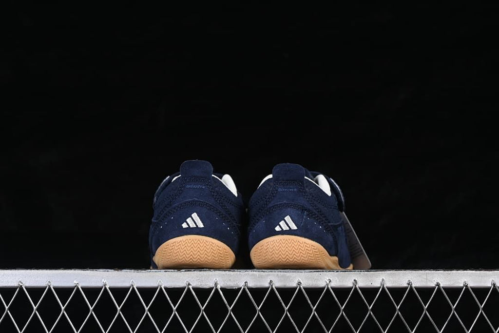 Rear view of the pair with gum-colored outsoles.