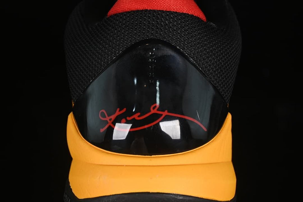 Rear view showing the red signature detail on the heel