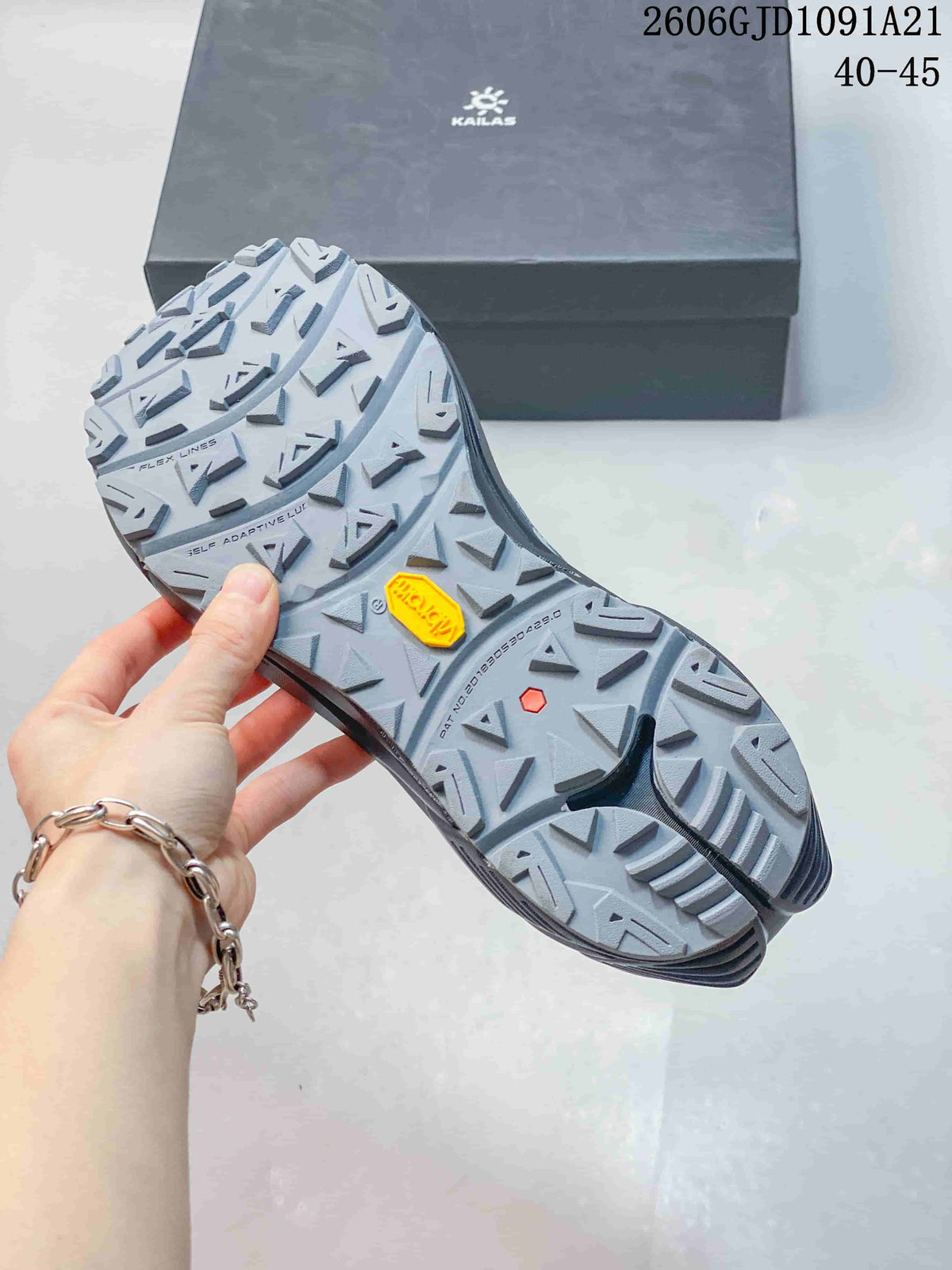Close-up of the trail shoe outsole showing its patterned lugs