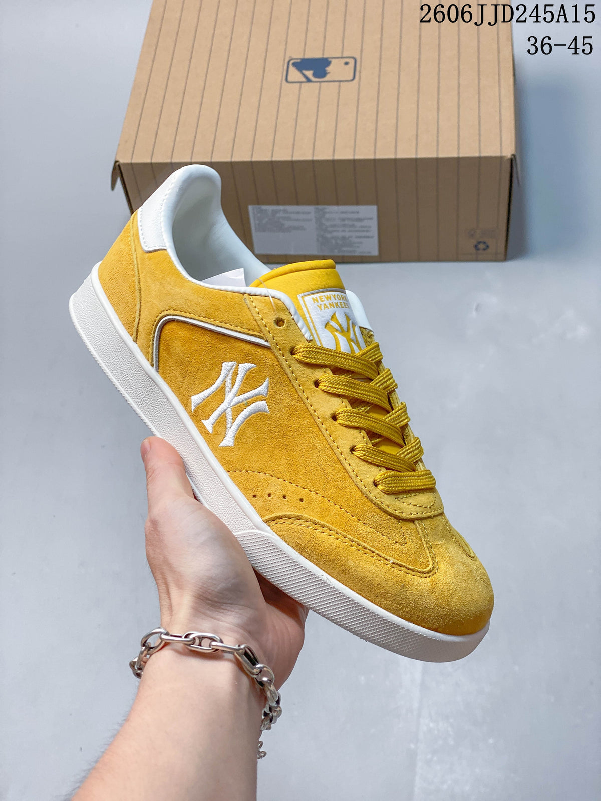 Yellow New York Yankees low-top sneaker with a white sole