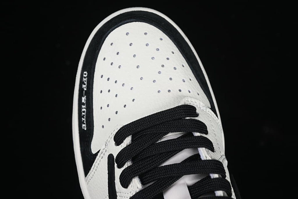 Top-down view of the perforated toe and black laces.