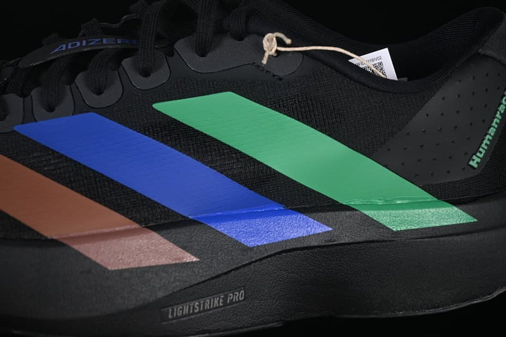 Close-up of the black upper, colored side accents, and Lightstrike Pro lettering.