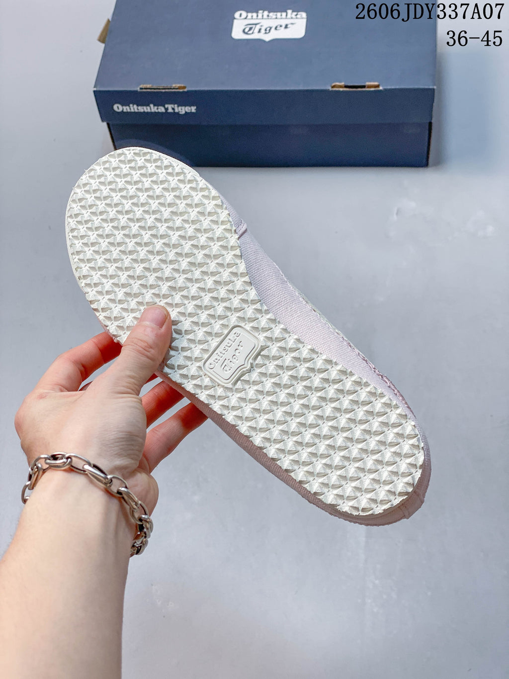 Textured outsole of a pink Onitsuka Tiger Mexico 66 Sabot shoe