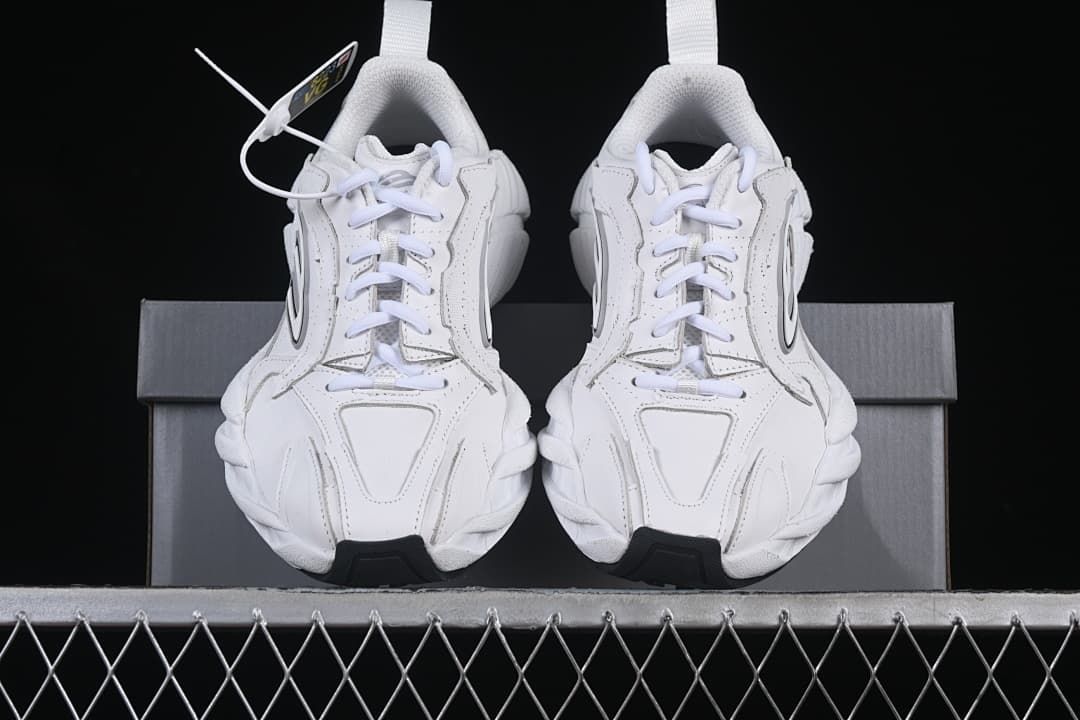 Front view of the pair of lace-up sneakers