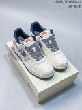 Pair of off-white Nike Air Force 1 '07 low-top sneakers with blue overlays, red Levi’s® labels, patterned laces, and a shoebox