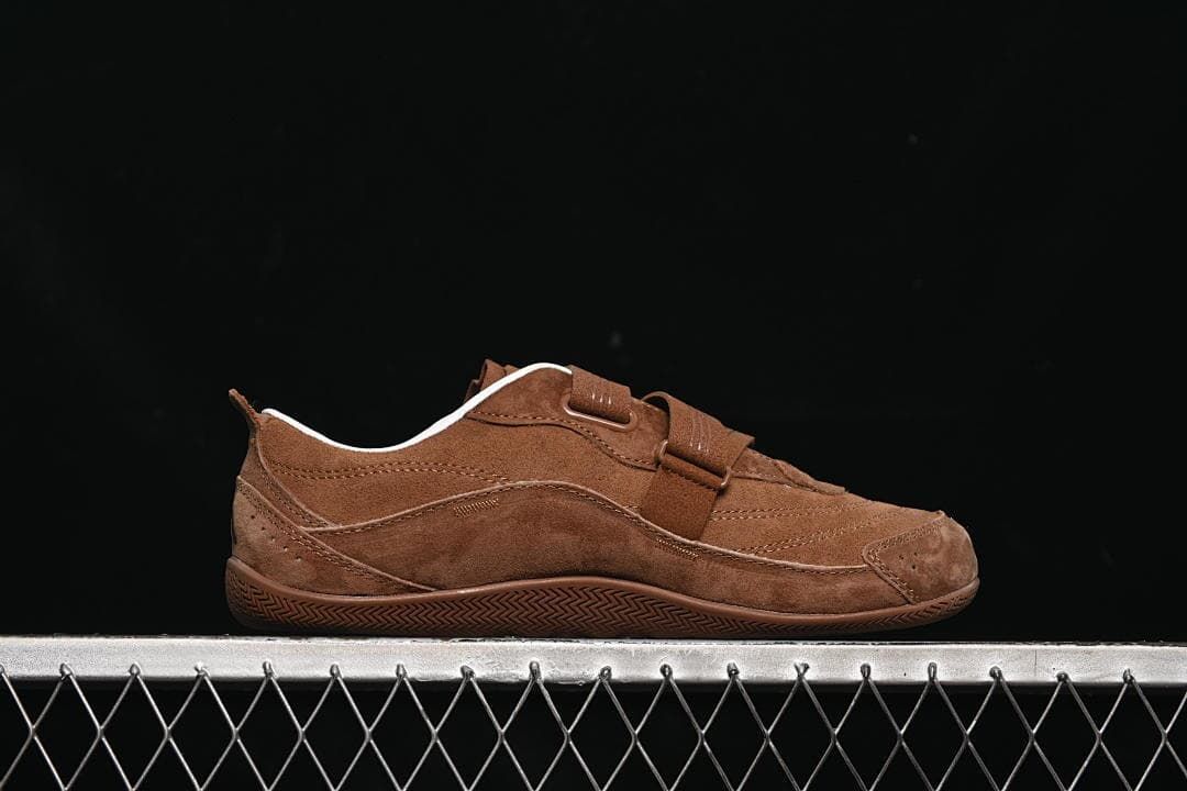 Side profile of the brown strap sneaker