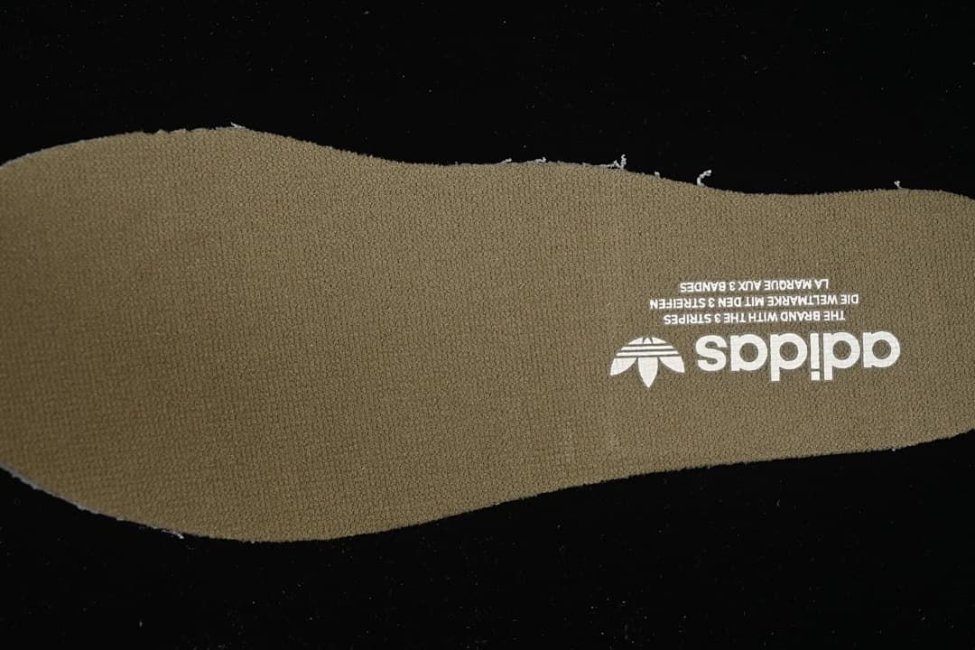 Olive-colored branded shoe insole