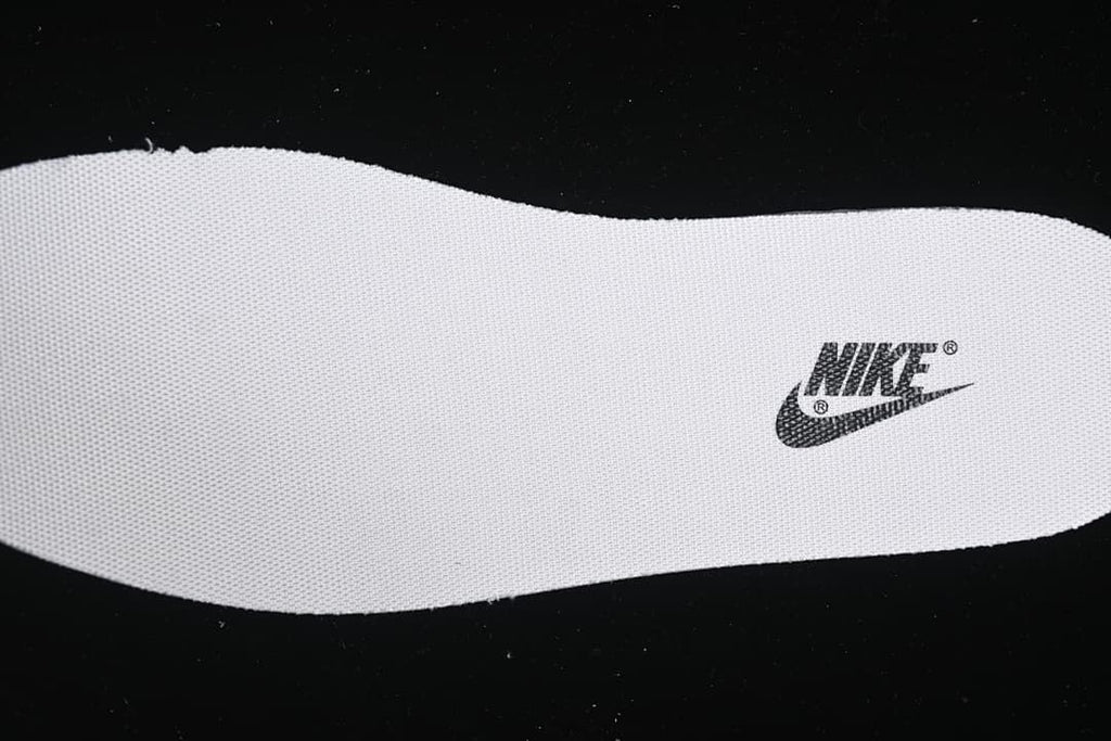 Close-up of a white insole with a Nike logo