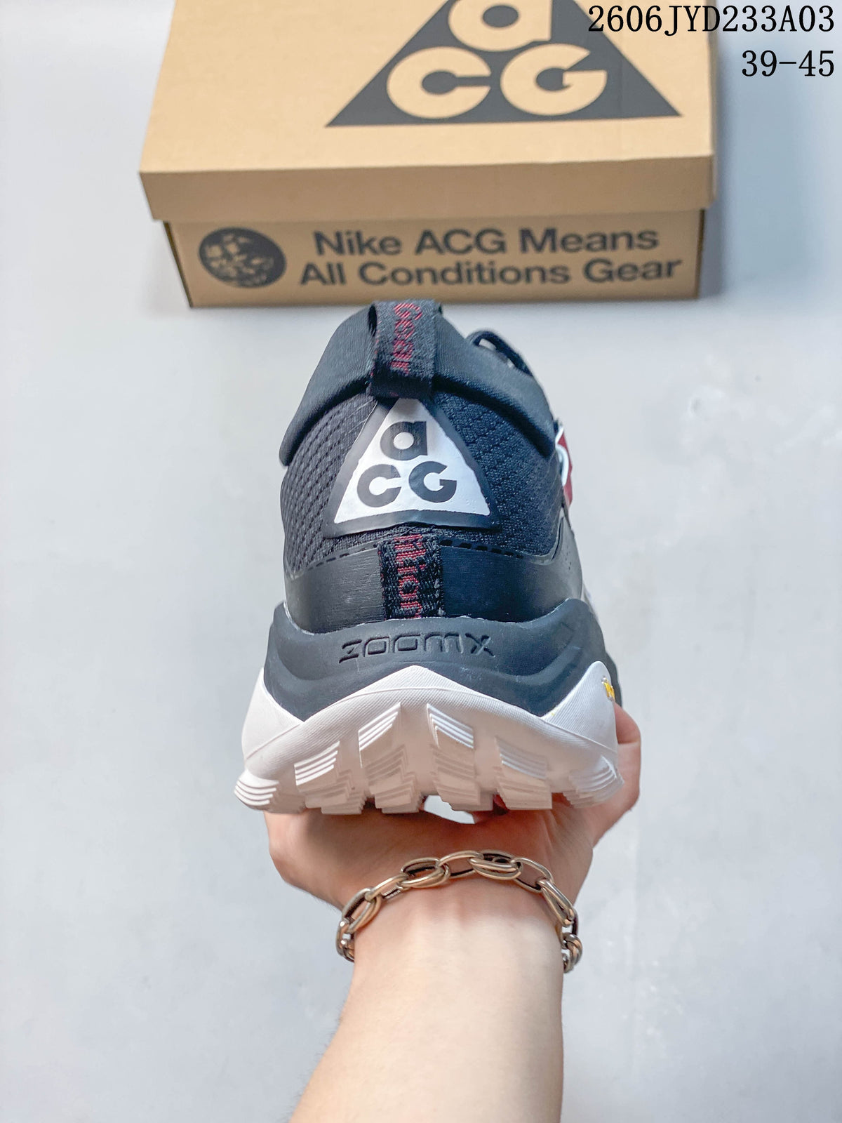 Rear view showing the high-cut collar and outsole
