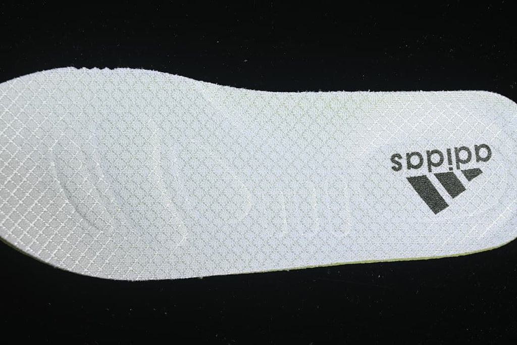 Textured shoe insert with adidas branding