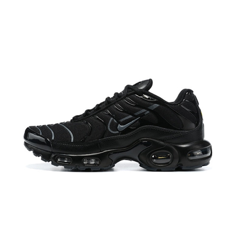 Black Nike Air Max Plus sneaker with gray accents and visible air units.