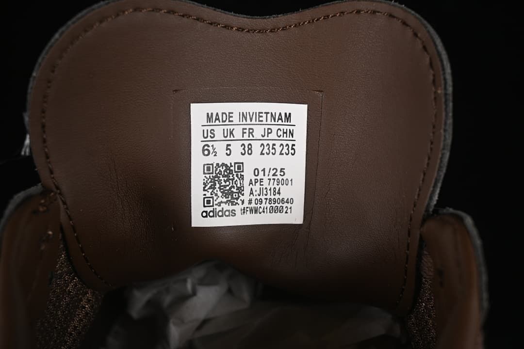 Tongue size label showing US 6.5, UK 5, FR 38, JP 235 and CHN 235, with style code JI3184