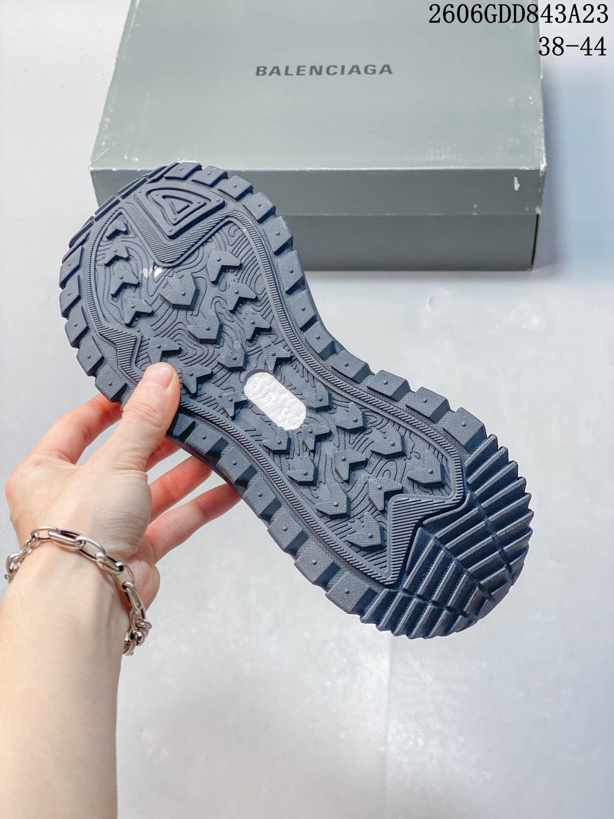 Close-up of the sneaker's chunky treaded outsole