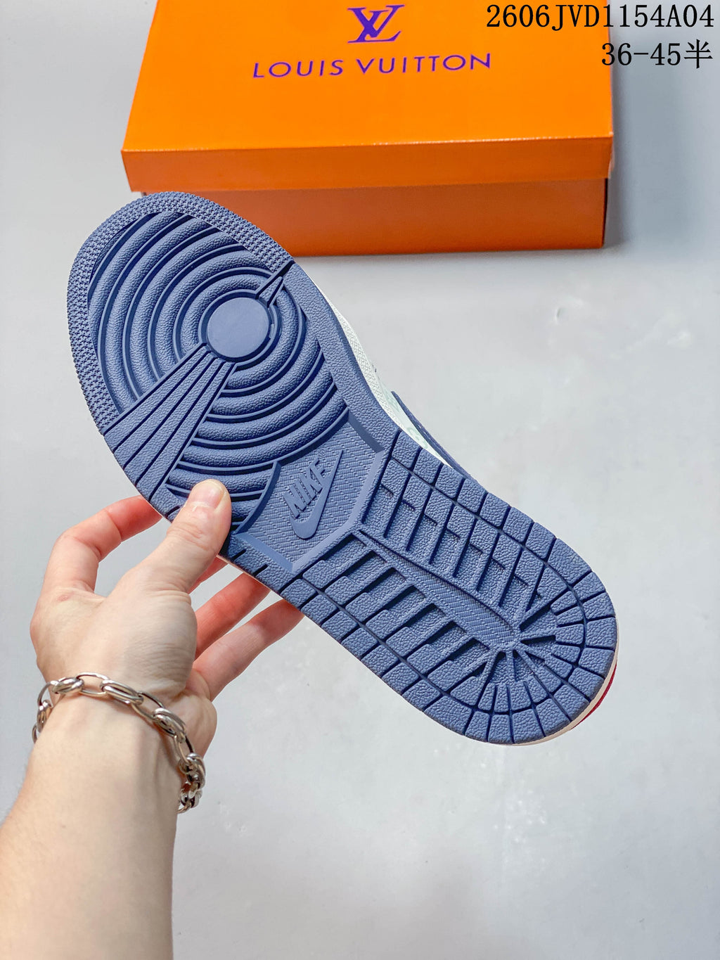 Blue outsole of the low-top sneaker.
