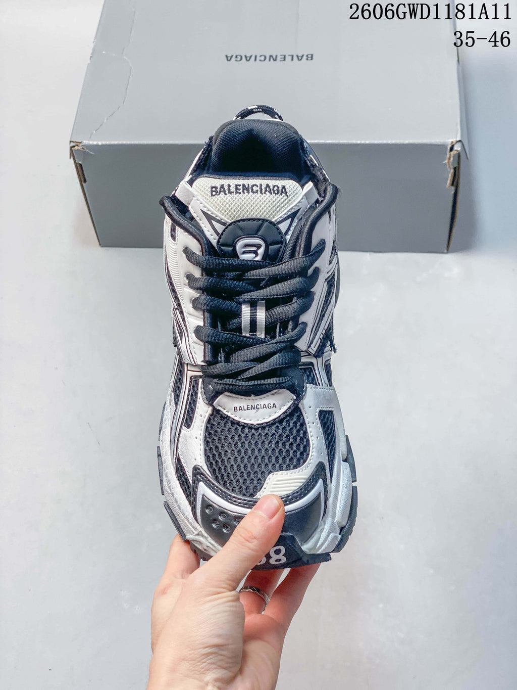 Top view of a Balenciaga Runner Gradient sneaker showing its laces and mesh toe panel